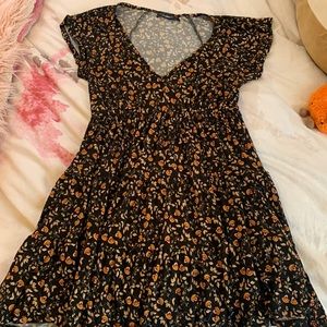 Urban outfitters polyester dress with low cut neckline and floral print!
